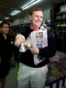 The treasures Peter Costello buys groceries on the first morning of the GST.